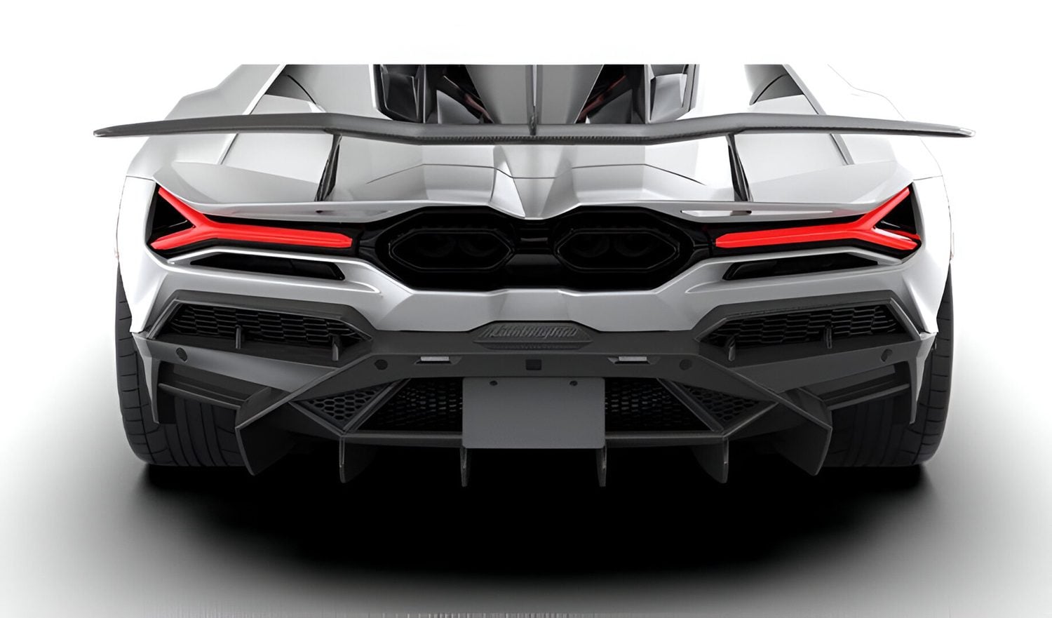 Rear diffuser on a white Lamborghini Revuelto, straight rear view