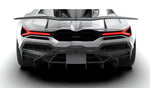Rear diffuser on a white Lamborghini Revuelto, straight rear view