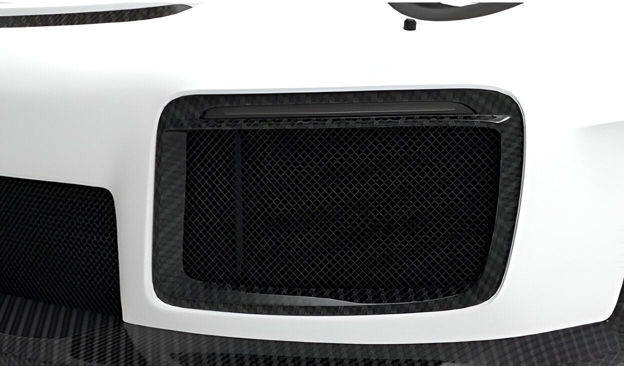 Carbon DRL surround on a white Porsche GT2 RS bumper