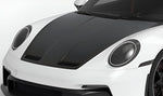 Carbon vented hood on a white Porsche 911 GT3 (992), close-up render