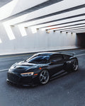 Black Audi R8 2020+ front three-quarter with the complete aero kit, tunnel exit