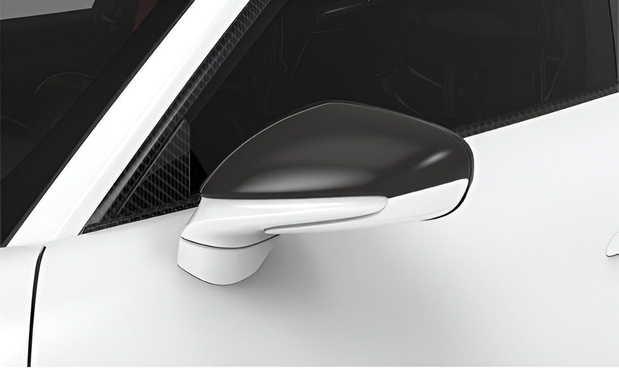 Carbon mirror cap on a white Porsche 911 GT3 (992)