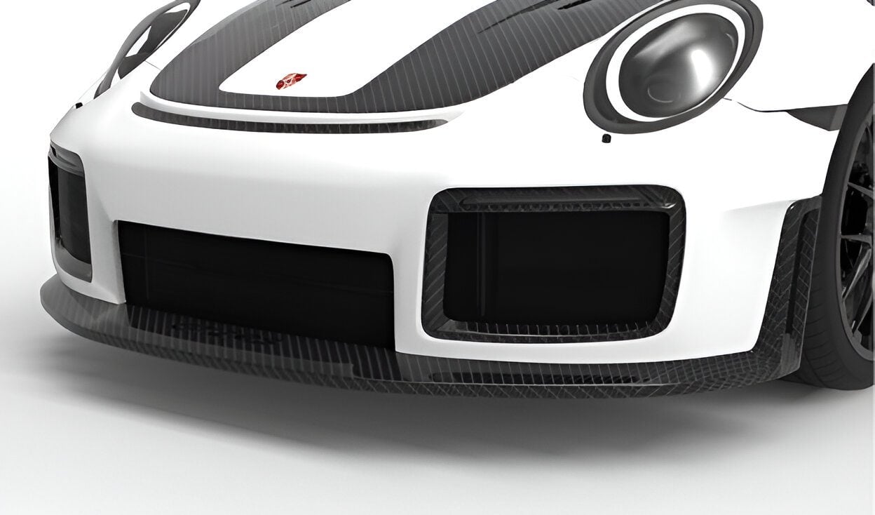 Carbon front lip on a white Porsche 911 GT2 RS, close-up