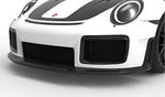Carbon front lip on a white Porsche 911 GT2 RS, close-up