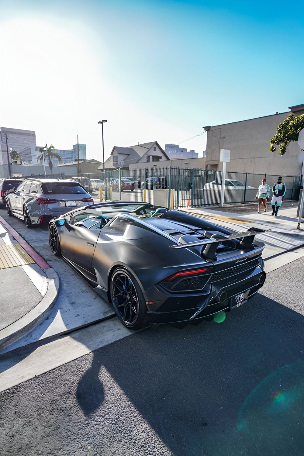 Black Huracan Performante Spyder rear three-quarter showing the diffuser