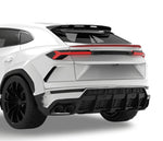 White Urus rear view with carbon trunk spoiler and diffuser