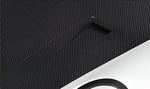 Carbon hood vent set into a carbon GT3 RS hood, close-up