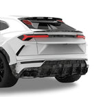 Rear of a white Urus with roof spoiler wing tips and forged carbon diffuser
