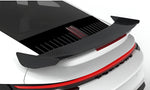 Carbon rear wing on a white Porsche 911 Turbo S (992), close-up render