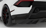 Close-up of the carbon rear diffuser fins on a white Huracan