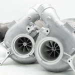 A close up view of Pure Turbos Turbo Upgrade Pure800 for Porsche 992 (3.0L) Carrera / S / GTS 2020-2025 with white background