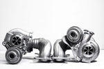 A front view of Pure Turbos BMW N54 Pure STG1 Upgrade Turbos behind a white background