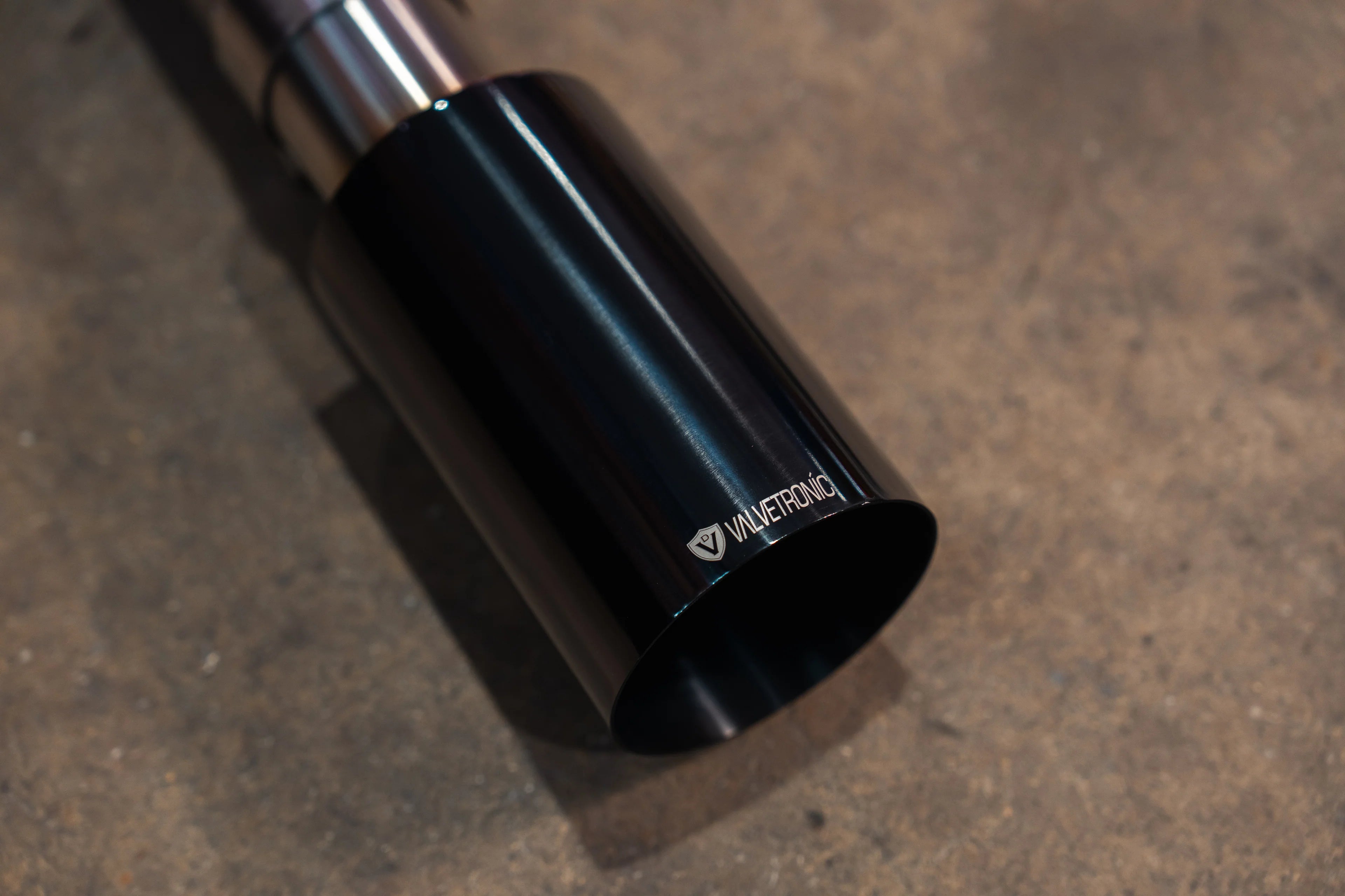 Valvetronic Designs Blackbear exhaust gloss black 4-inch angle-cut tip with laser-etched logo for Ram 1500 5.7 HEMI - AutoTalent
