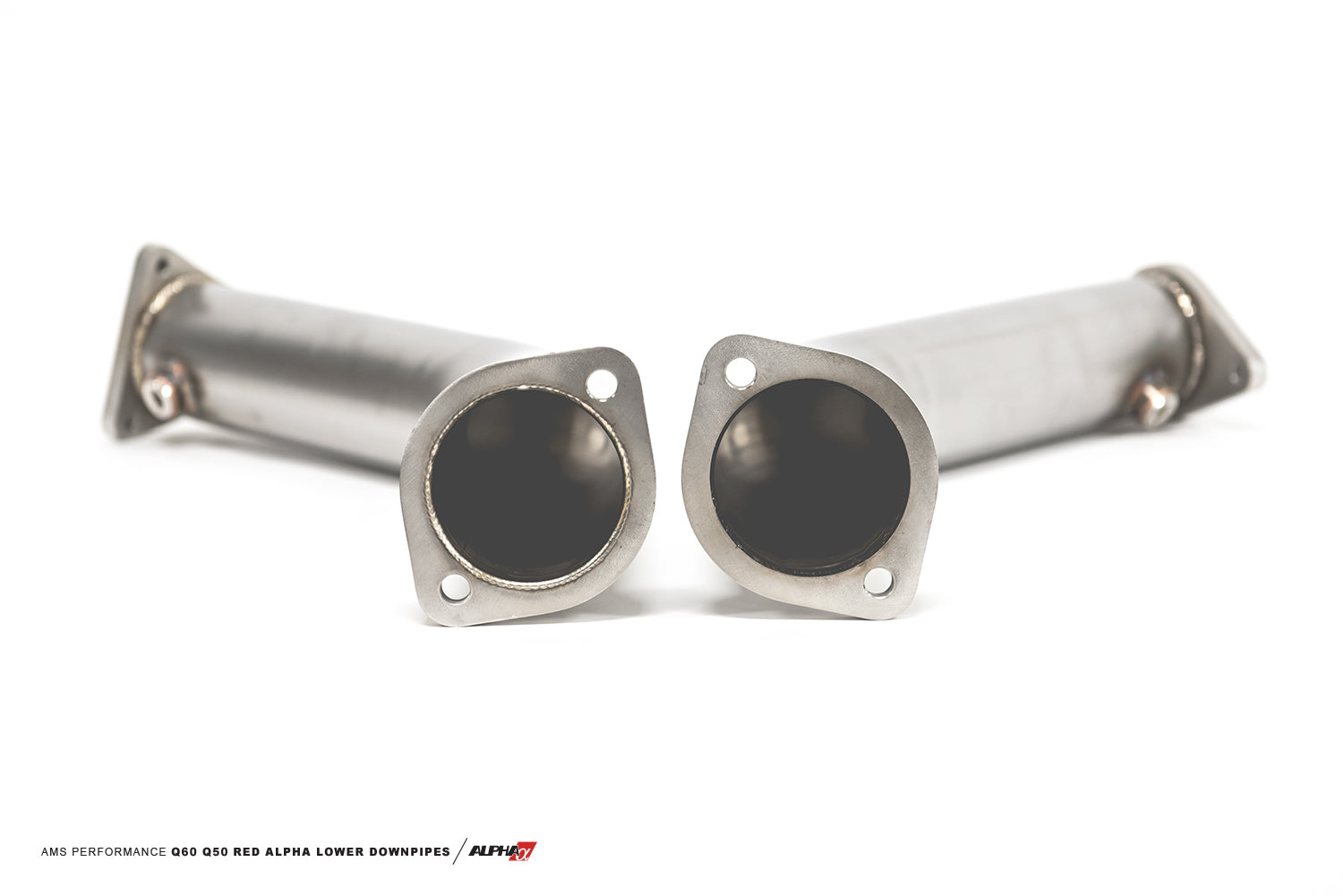 AMS race lower downpipe pair laid flat with the inlet flanges toward the camera