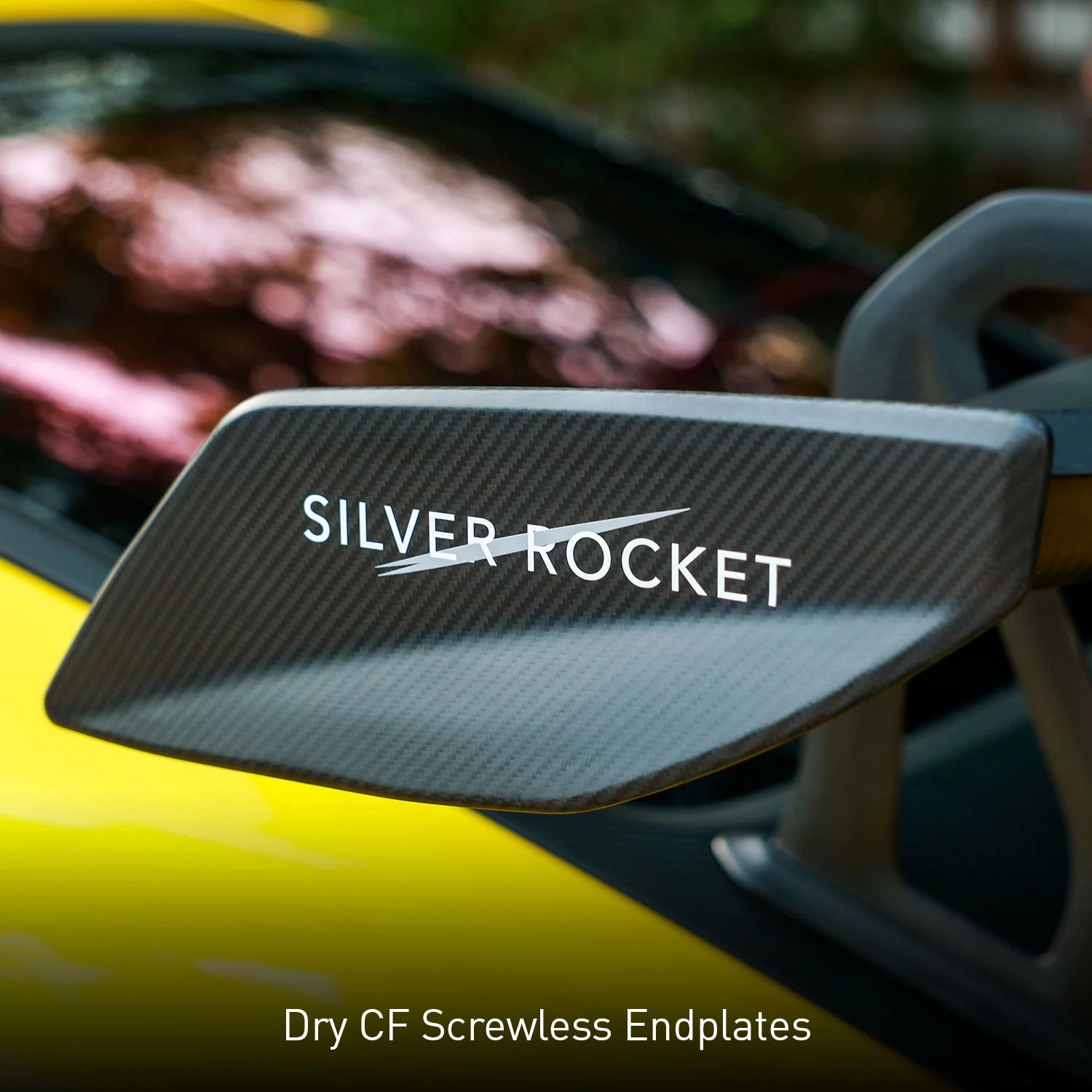 a closeup of carbon silver rocket wing showing the logo