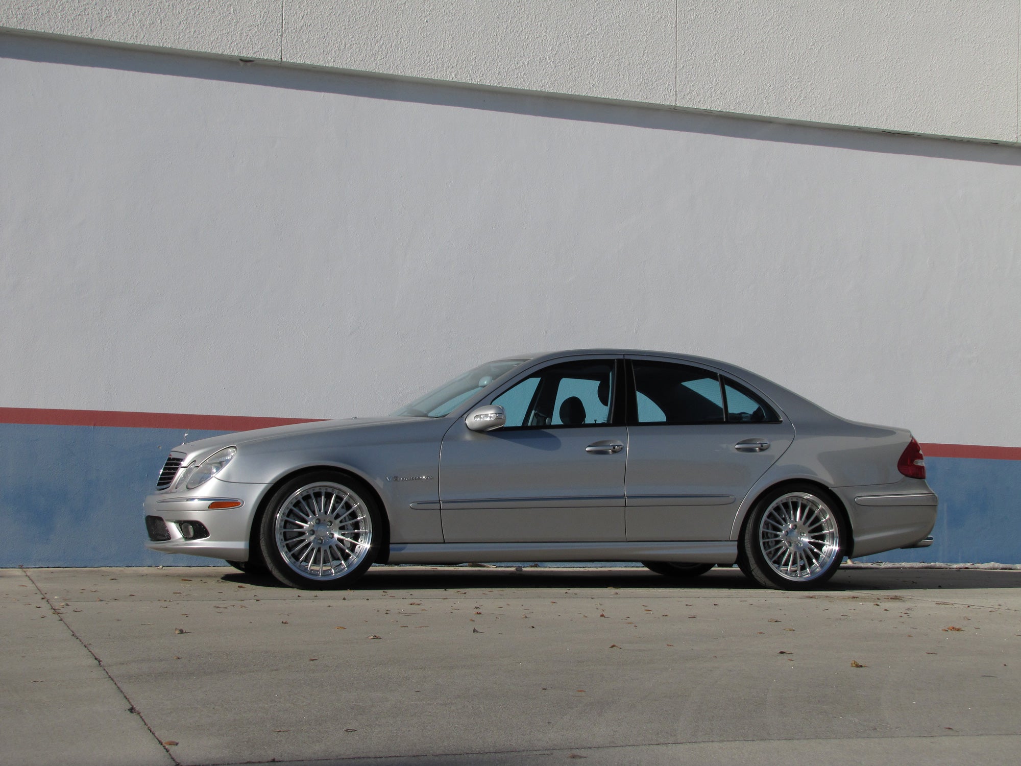 Silver E-Class car side view, wheels in focus - Multi-Spoke 19-inch Wheels for the 2003-2009 E-Class