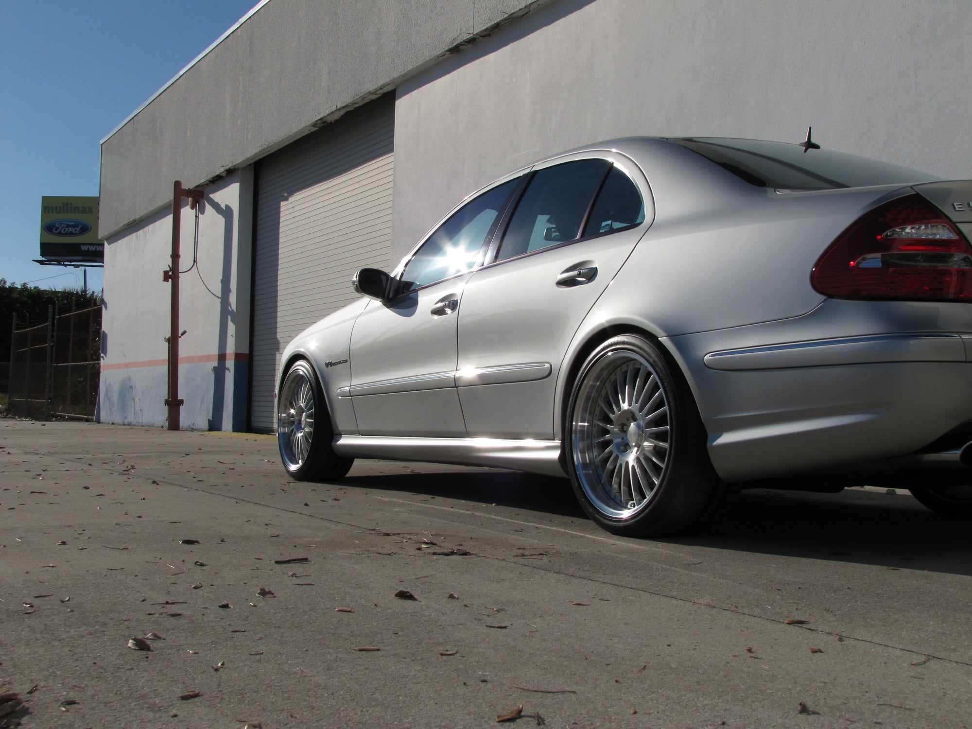 Silver E-Class car rear three-quarter on the wheels - Multi-Spoke 19-inch Wheels for the 2003-2009 E-Class