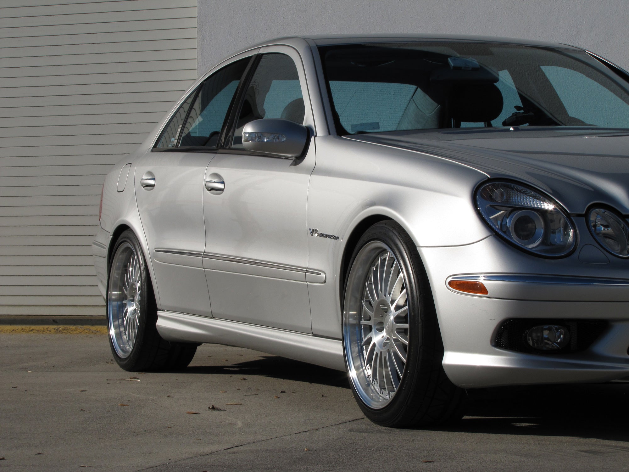 Front multi-spoke wheel on the silver E-Class car - Multi-Spoke 19-inch Wheels for the 2003-2009 E-Class