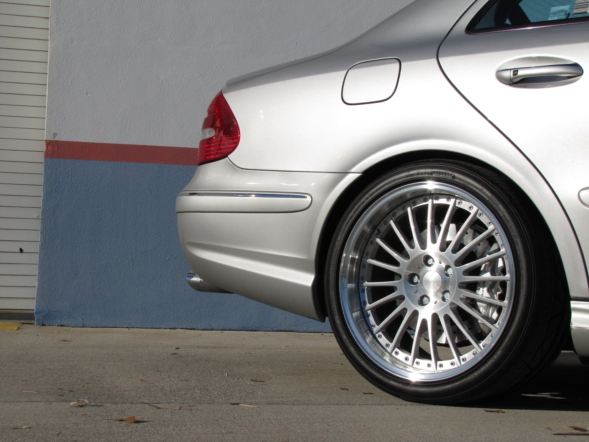 Rear multi-spoke wheel on the silver E-Class car close up - Multi-Spoke 19-inch Wheels for the 2003-2009 E-Class