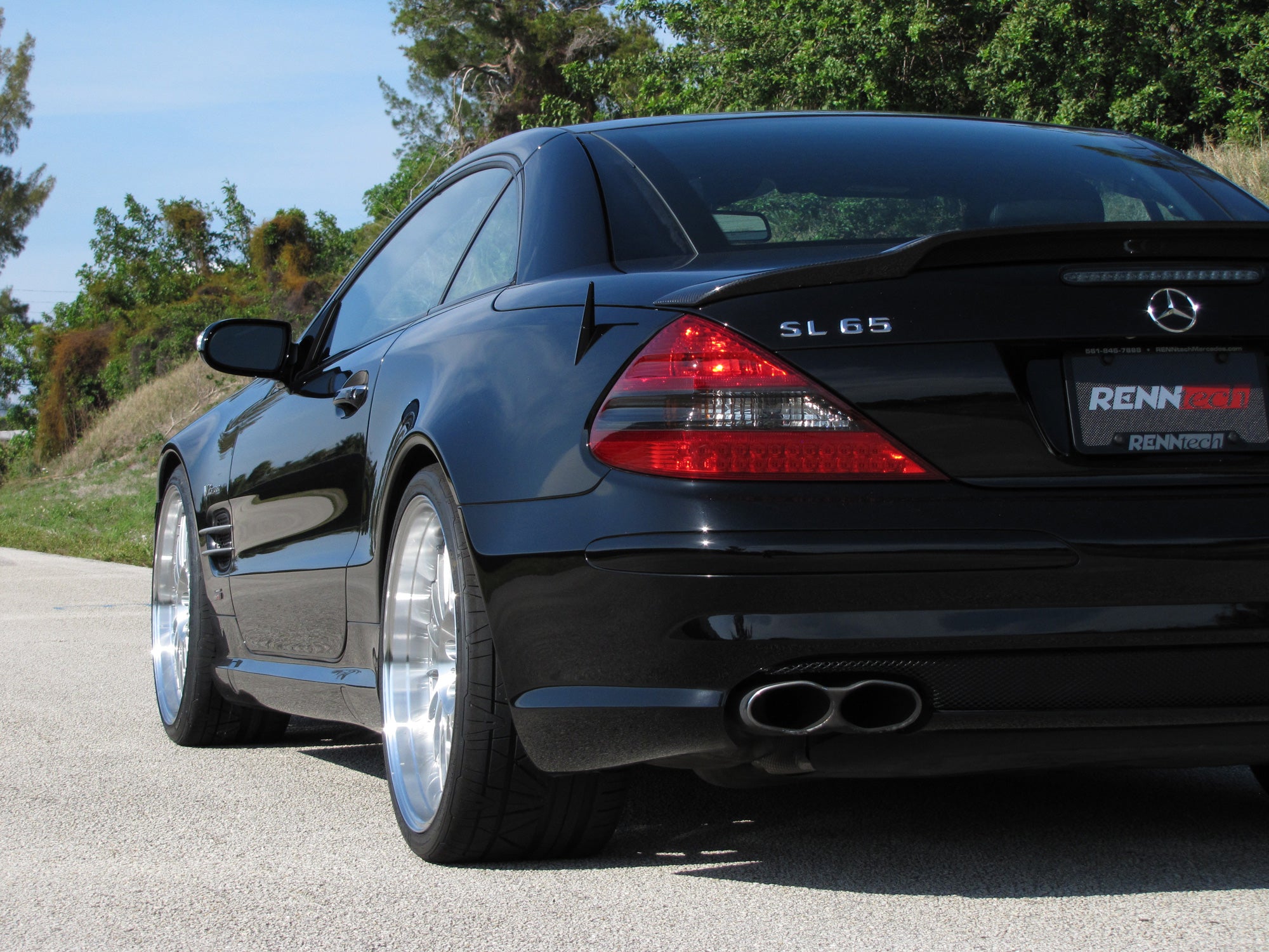 Black SL car rear three-quarter on RennTech multi-spoke wheels - Multi-Spoke 20/21-inch Wheels for the 2003-2020 SL-Class