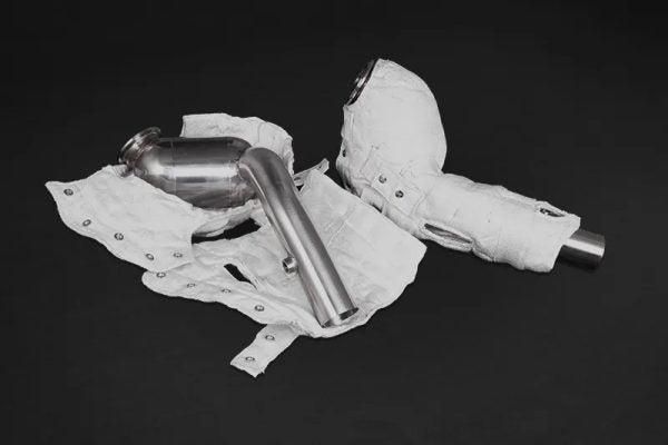 close view of Capristo 250 Cell Sport Cat Downpipes (with Heat Blankets) for Ferrari Portofino 2017–2020 with black background