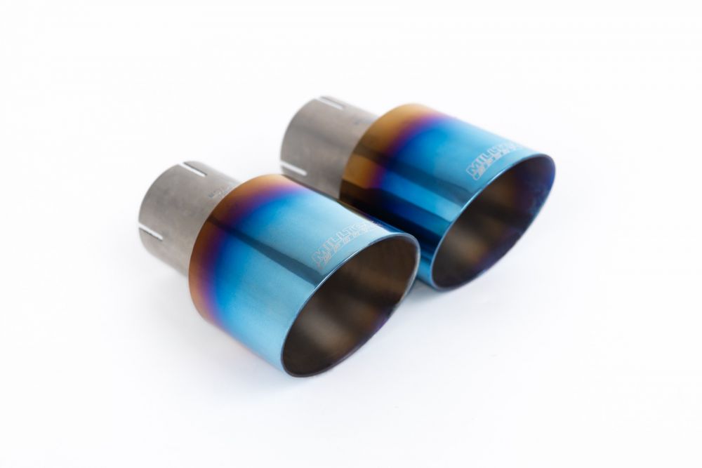 Close-up of burnt titanium (blue and bronze) Milltek Sport exhaust tips for the 2017-2018 Volkswagen Golf MK7.5 GTi (part SSXVW467)