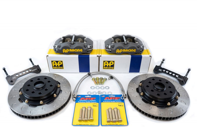 A front view of AP Racing by Essex Rally Competition Brake Kit (Front CP8350/299mm)- Subaru 2.5RS, WRX, STI with white background