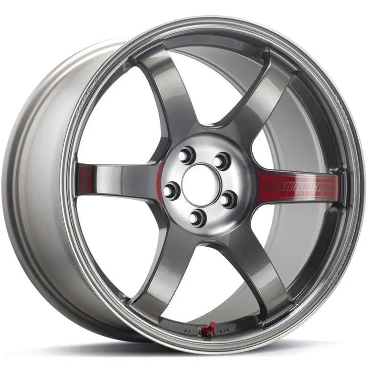 A front view of Volk Racing TE37 Saga SL Wheel 17x7.5 4x100 31mm Pressed Graphite with white background