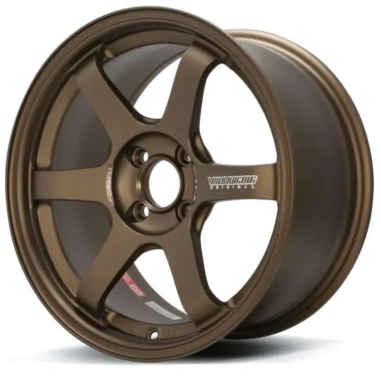 A front view of Volk Racing TE37 Sonic Wheel 16x7 4x100 48mm Bronze with white background