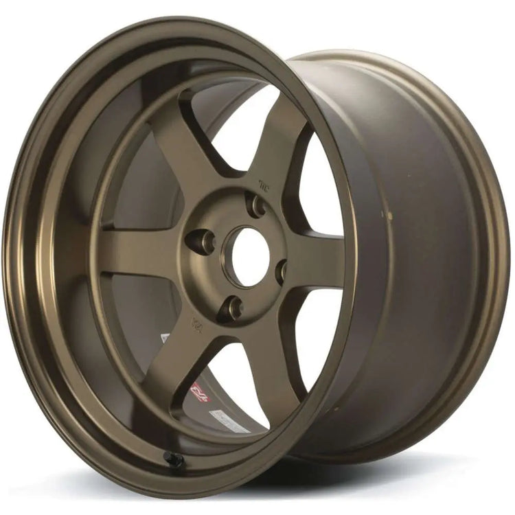 A front view of Volk Racing TE37V Mark-II Wheel 18x9.5 5x114.3 0mm Bronze with white background