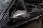 A close up view of TECHART Side Mirror Shells Glossy Carbon Fiber Porsche 991.2