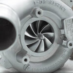 A close up view of Pure Turbos Turbo Upgrade Pure650 for Toyota Supra (A90/A91) 2020+ with white background 