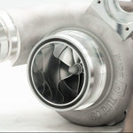 A close up view of Pure Turbos Turbo Upgrade NEW Pure900 for BMW B58 (G-Chassis) 2020+ with white background