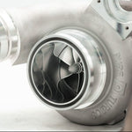 A close up view of Pure Turbos Turbo Upgrade NEW Pure900 for Toyota Supra (A90/A91) 6-Port 2021+ with white background