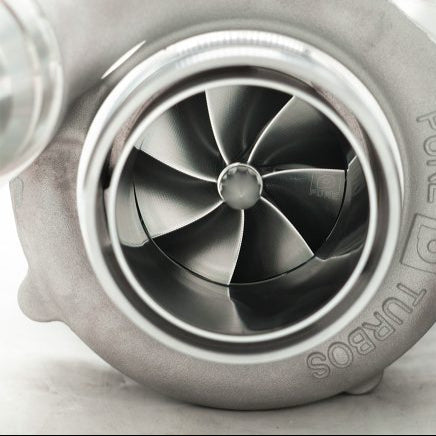 A close up view of Pure Turbos Turbo Upgrade NEW Pure900 for BMW B58 (G-Chassis) 2020+ with white background