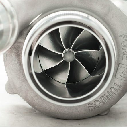 A close up view from the front of Pure Turbos Turbo Upgrade NEW Pure900 for Toyota Supra (A90/A91) 6-Port 2021+ with white background
