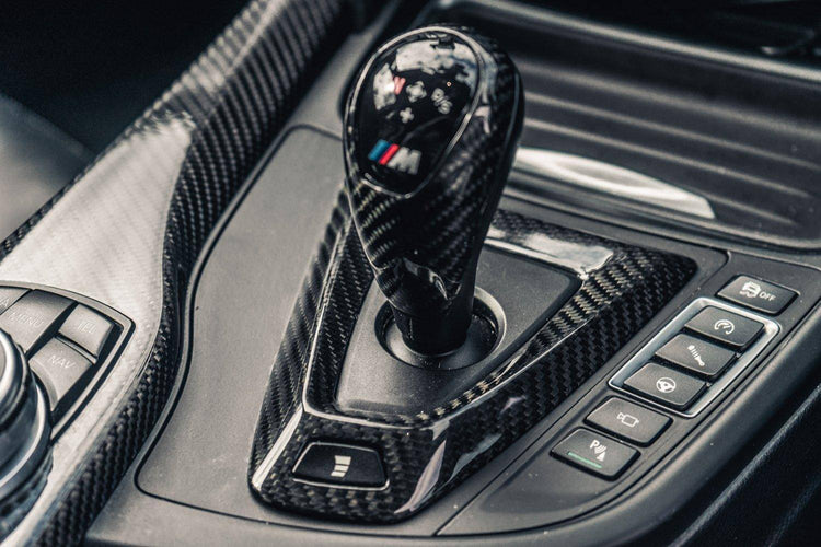 wide view of TRE Pre-preg Carbon Fibre Gear Selector Flat Surround for BMW 1 Series / 2 Series / M2 2011-2021 fitted inside a car