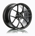 A side view of 7 T-S5 Forged Split 5 Spoke Exotic Wheels in Machine Black for BMW E36 M3 1992-1999
