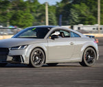 A wide view of an Audi on the road with the wheels fitted with AP Racing by Essex Radi-CAL ENP Competition Brake Kit (Front CP9660/372mm)- Audi TTRS (8S)