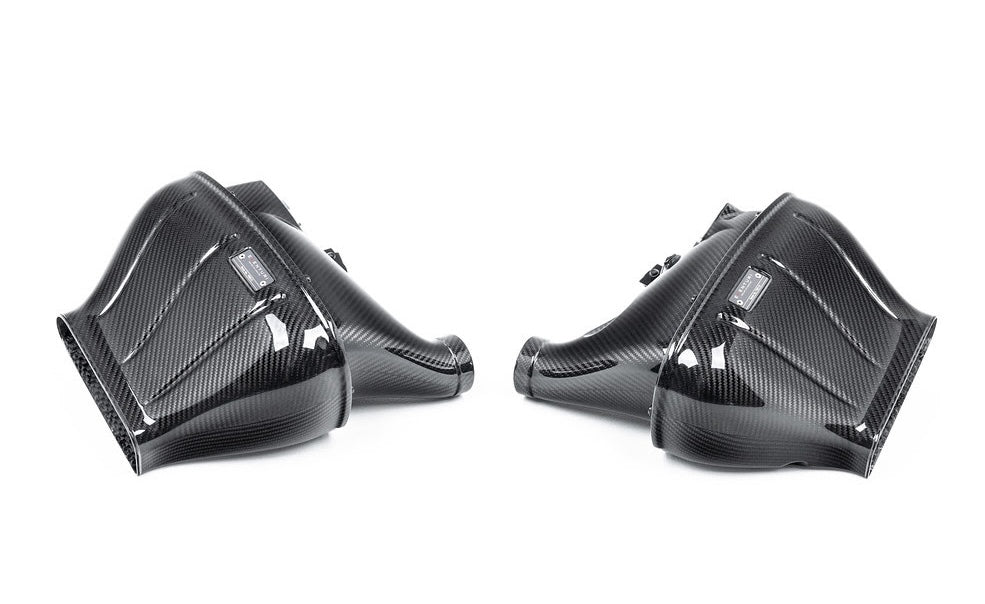 A top view of the intake parts of the Eventuri Carbon Intake System for Mercedes G63 AMG 2019-2025 from the on a white background