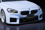 A front close up view of a white car fitted with Armaspeed Carbon Fiber Front Lip Spoiler for BMW G87 M2 2023+ on a black background