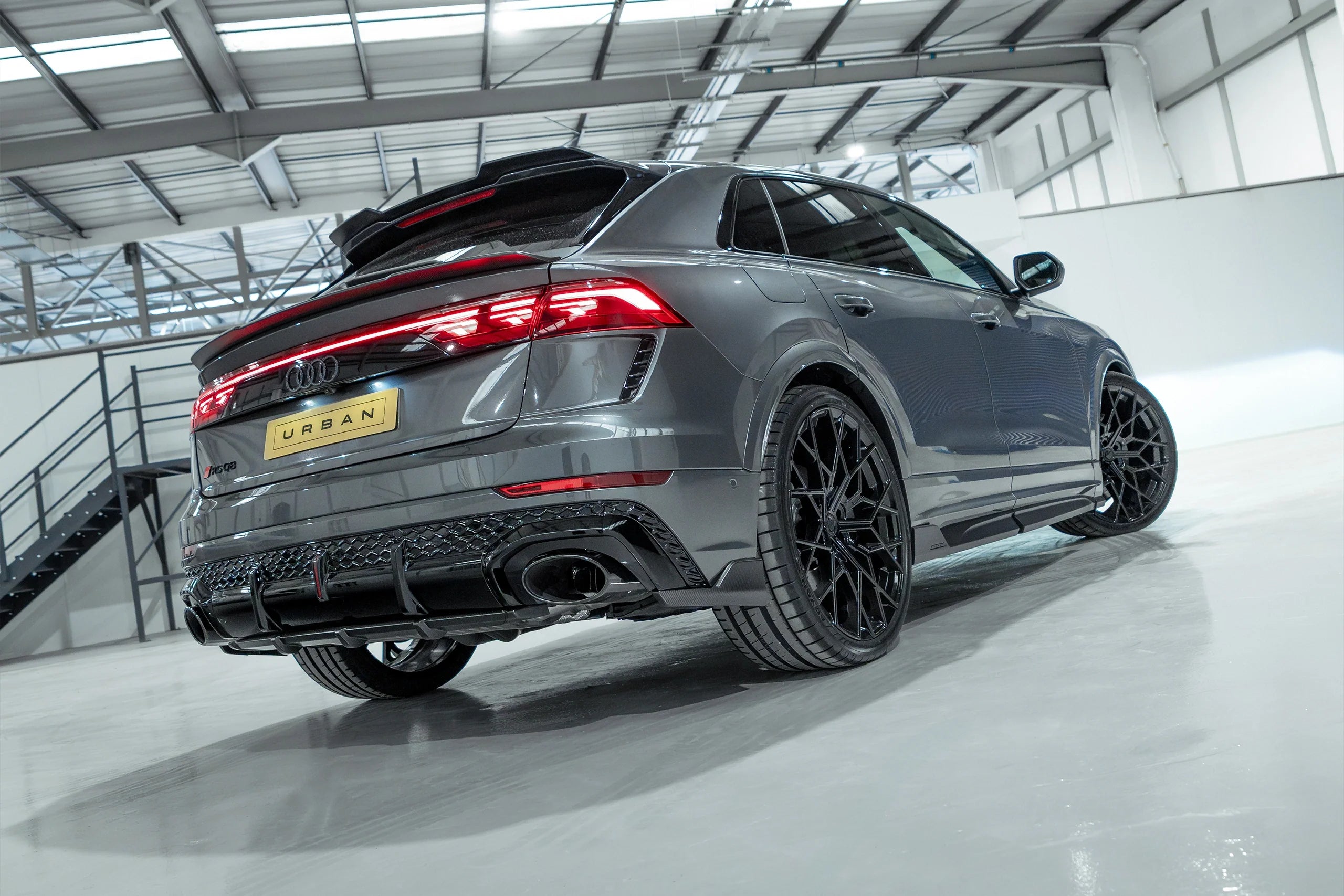 Rear view of an Audi RS Q8 facelift with the Urban carbon diffuser and rear wing