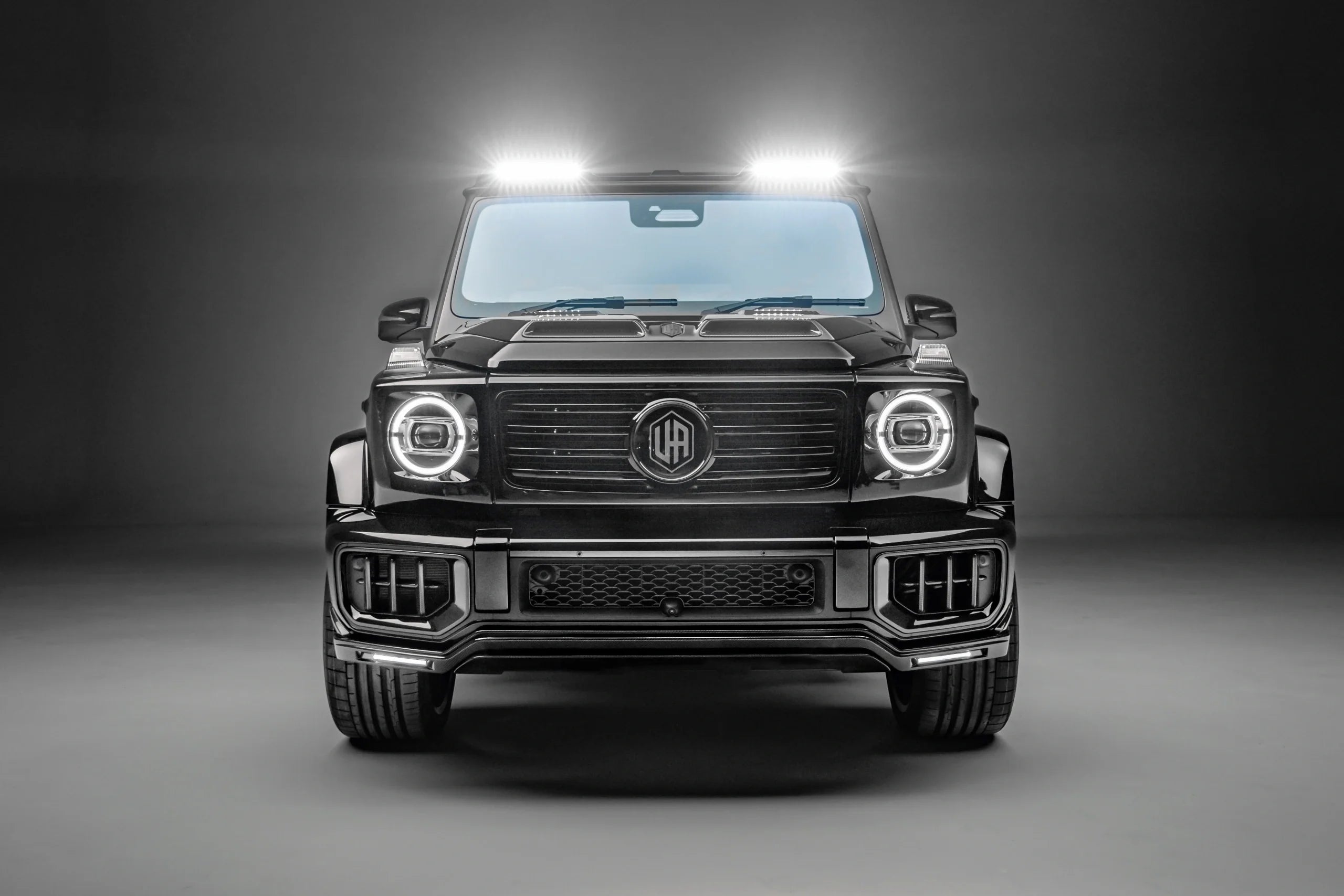 Urban W465 G63 Aero Kit with the 12-light carbon roof bar and splitter DRLs switched on
