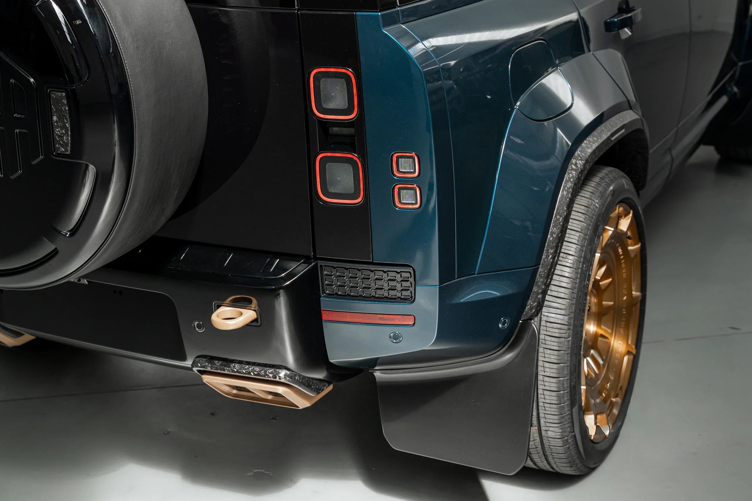 Rear view of a Land Rover Defender OCTA fitted with the Urban OCTA V2 wheel cover