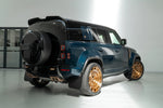 Rear three-quarter view of a Defender OCTA with the Urban OCTA V2 spare wheel cover
