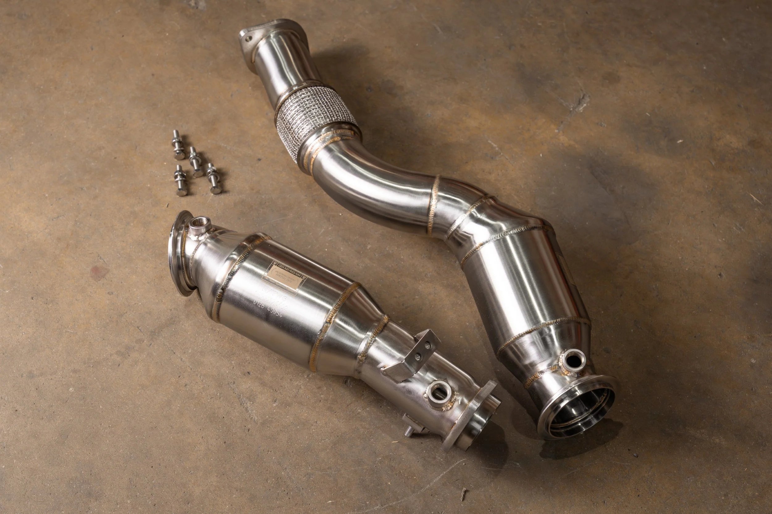 Valvetronic designs BMW G80 M3 G82 M4 G87 M2 catted downpipe pair on floor