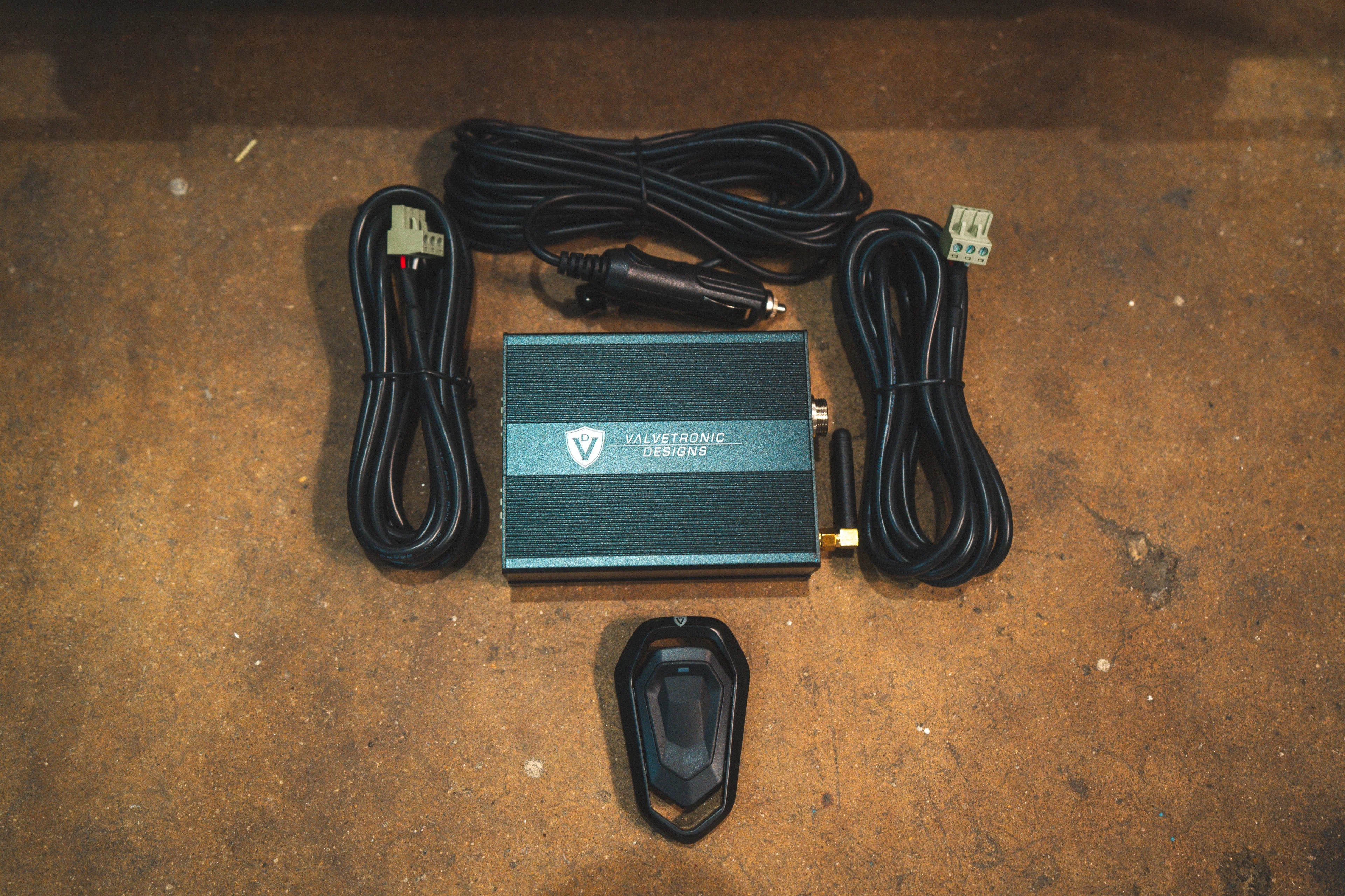 Valvetronic Designs exhaust valve controller, remote, wiring harness, and power cable for BMW X5 and X6 valved exhaust system