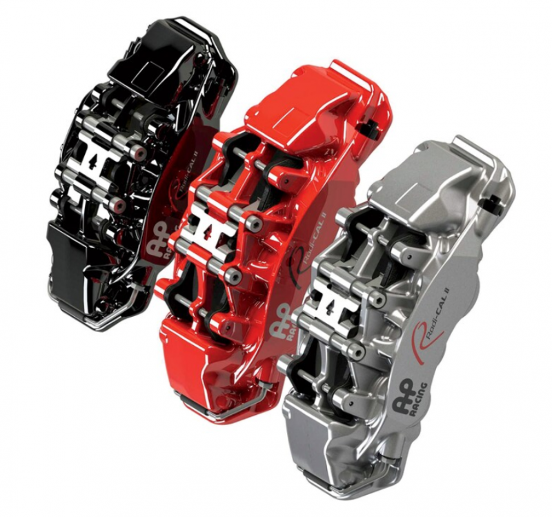 A side view of the red, black and silver of the AP Racing by Essex Road Brake Kit (Rear 9541/380mm)- BMW E90/E92/E93 M3 & 1M Coupe with a white background