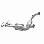 MagnaFlow 458023 carb direct-fit catalytic converter, opposite rear three-quarter view of the turntable spin