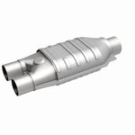 MagnaFlow 447107 universal catalytic converter, front three-quarter view of the turntable spin